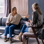 Manager and employee discussing sexual harassment prevention in the workplace