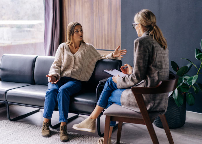Manager and employee discussing sexual harassment prevention in the workplace